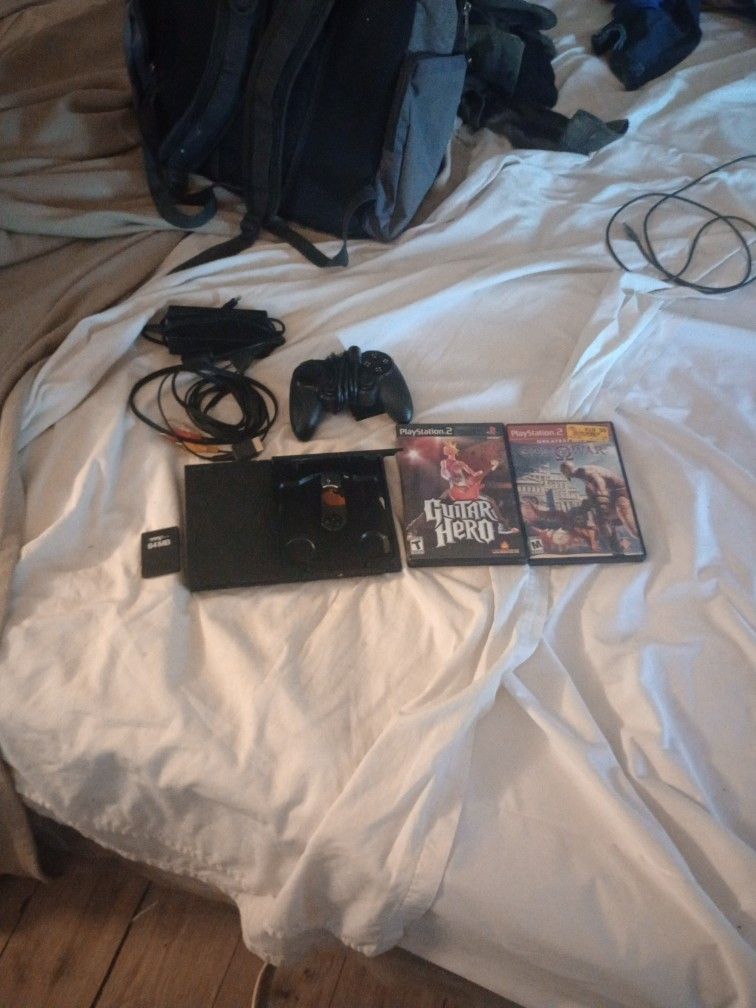 PlayStation 2 Slim With Two Games One Controller One Memory Disc All The Power Cords