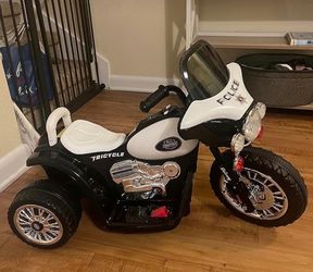 Kids Motorcycle - 3-Wheel Ride on Toy with Police Decals, Reverse, and Headlights - 6V Electric Motorcycle for Kids Ages 3 to 6 by Lil' Rider (Black)
