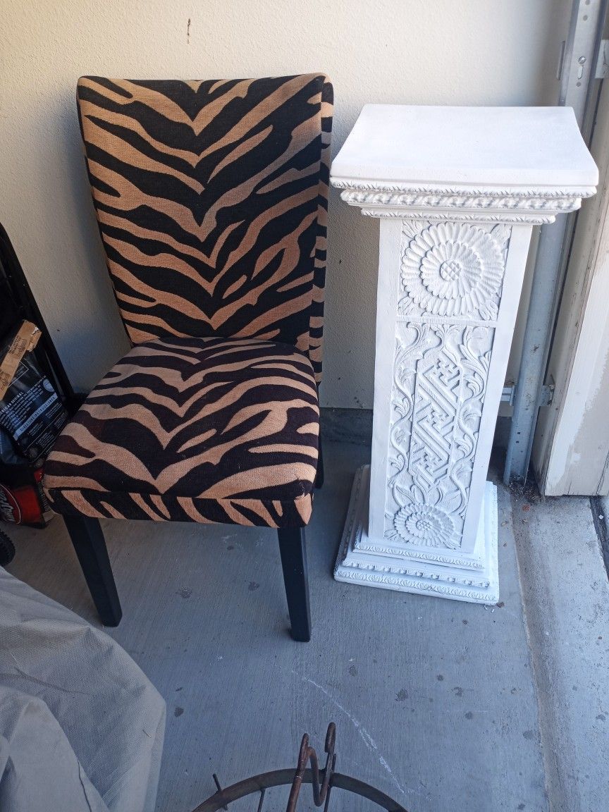 Tiger Print Chair  $25 & White Baroque Column $35 Sold Seperate