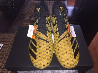 Gold/Black football cleats