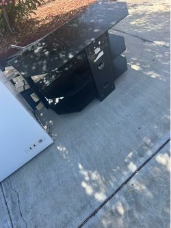 TV stand table made out of glass and metal