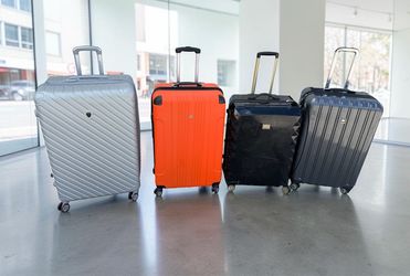 $20 each! Large Checked 4 Wheel Rolling Travel Luggage Baggage Suitcases!