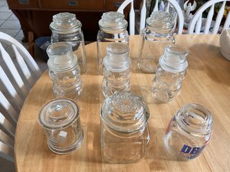 Anchor Hocking 9 Clear Glass Canisters With Air Tight Lids.