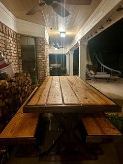 Farm style wood table with two benches