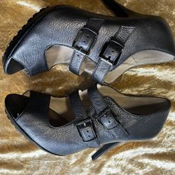 Michael Kors black leather peep-toe heels with double buckle closures