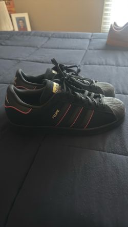 Brand new men’s Adidas size 9