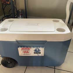 Coleman 62QT Ice Chest Rolling Cooler with Wheels, Lakeside Blue
