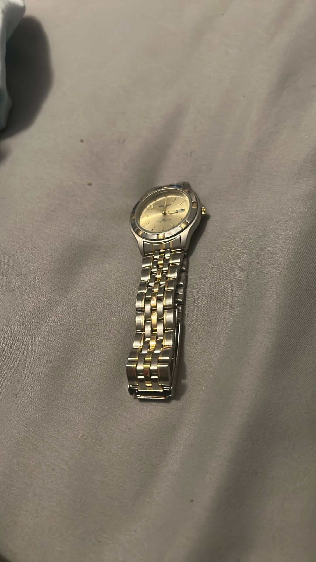 silver and gold watch