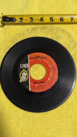 This item is a vintage 7-inch vinyl record, specifically a 45 RPM single titled "The Popeye Waddle" by Don Covay, released on the Cameo Records label 