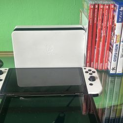 NINTENDO SWITCH OLED AND REGULAR SWITCH CONSOLE 