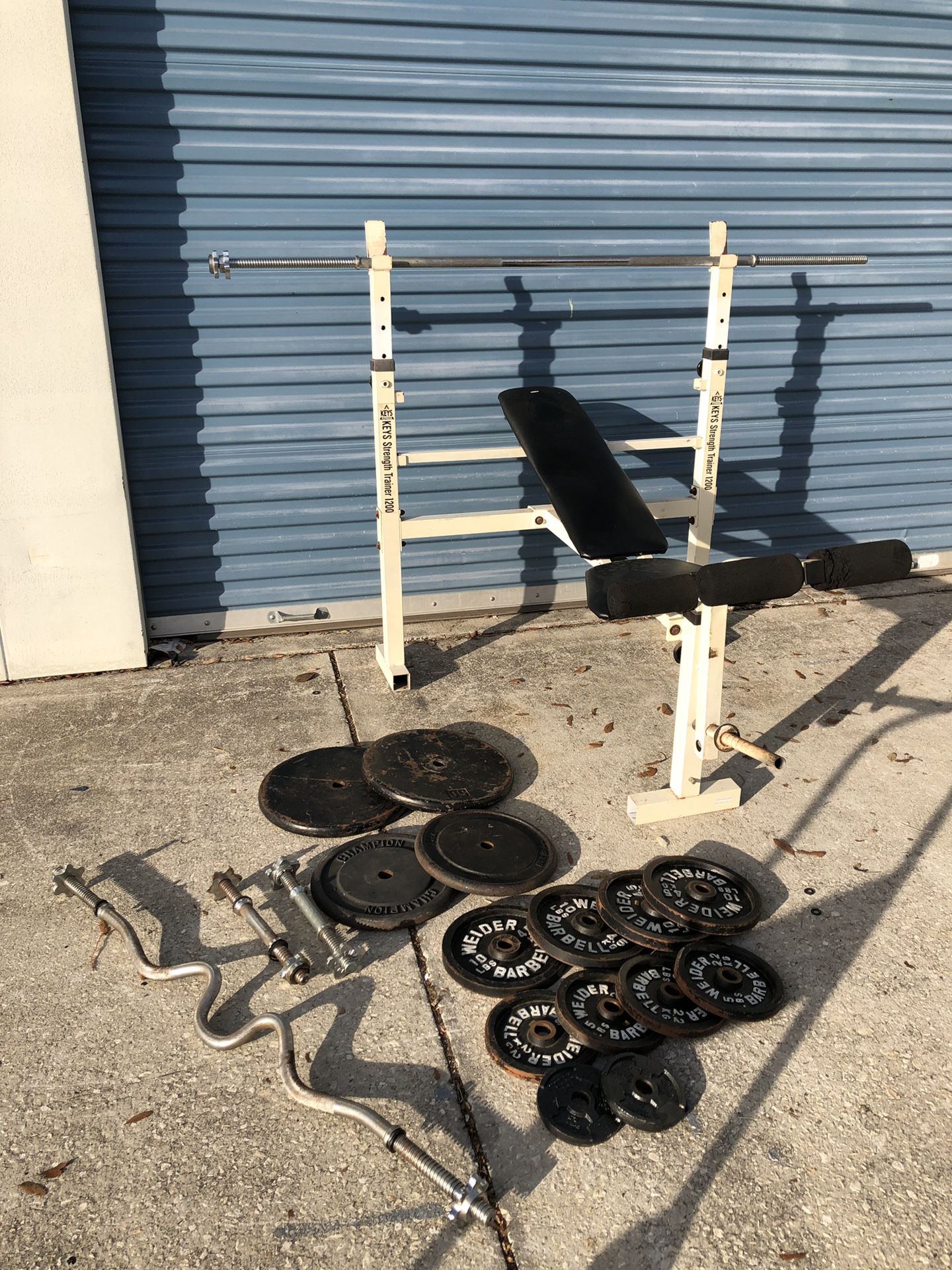 Bench with 215 lbs of weights and bars!