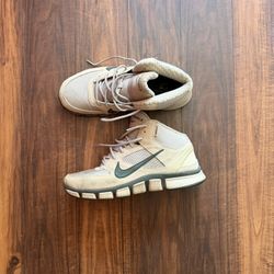 Nike Free Trainer 7.0 Shield high-top training sneakers in a khaki/cargo colorway. Size 10 US