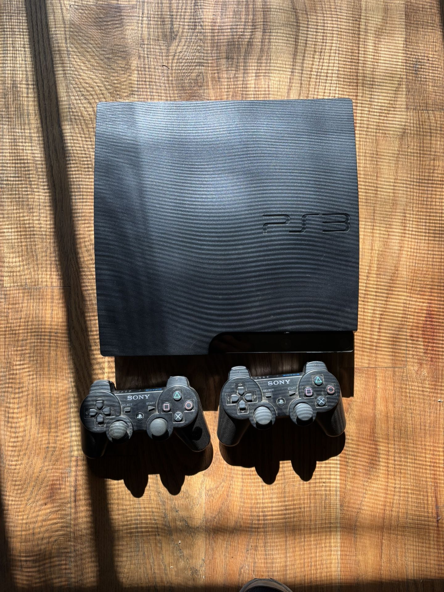 PS3 With 17 Games Two Controllers