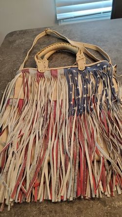 VERY NICE AMERICAN FLAG PURSE..RED WHITE N BLUE WITH STARS..WITH HANDLES AND LONG STRAP