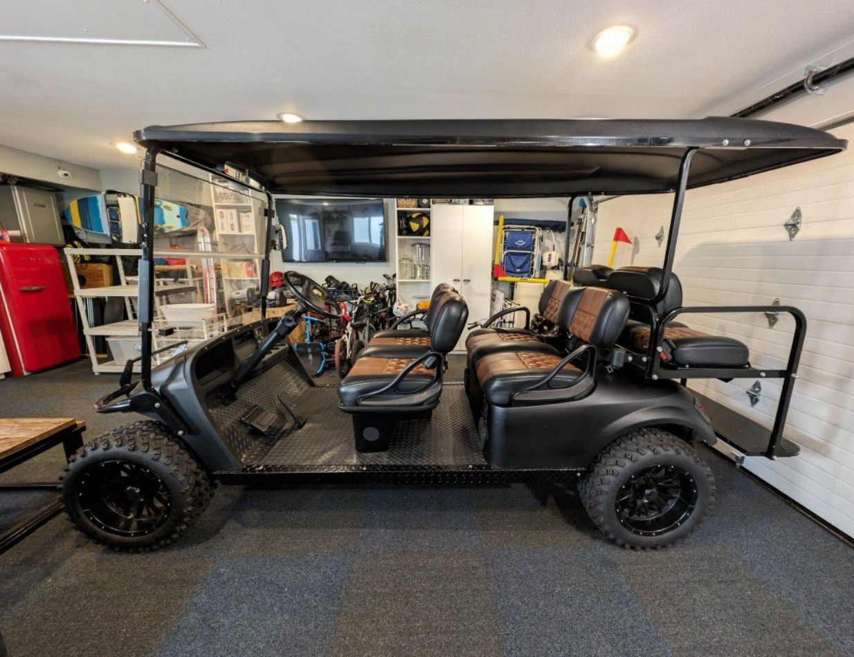 LIFTED 6-SEAT MATTE BLACK ELECTRIC GOLF CART