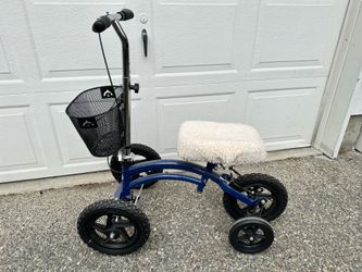 Knee scooter with basket