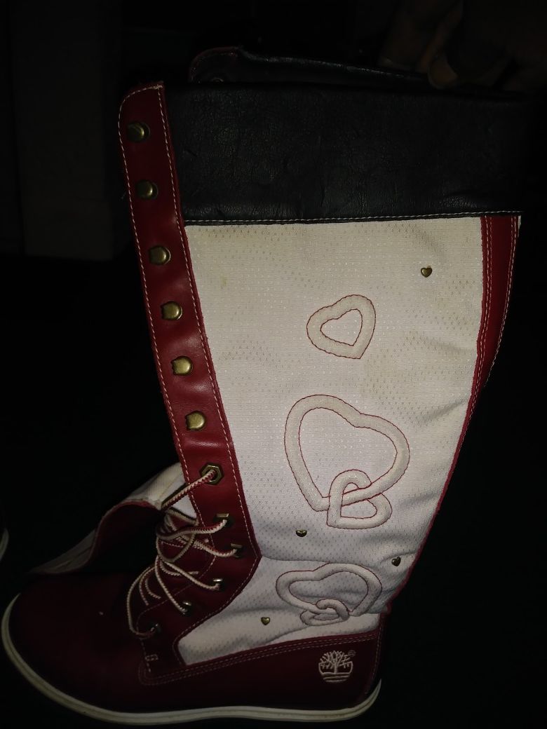 Red and white timberland boots