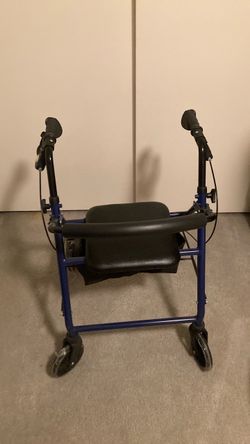 4 wheel Walker w/seat & brakes