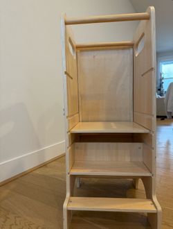Learning tower with slide and activity board