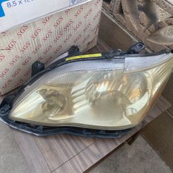 2007 AVALON touring Driver Side Headlight