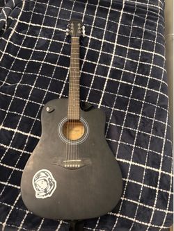 Black 6 string guitar