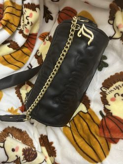 Juicy Couture Tootsie Roll Bag