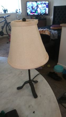 Small black with white shade lamp
