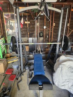 Olympic gym set with rubber weights.