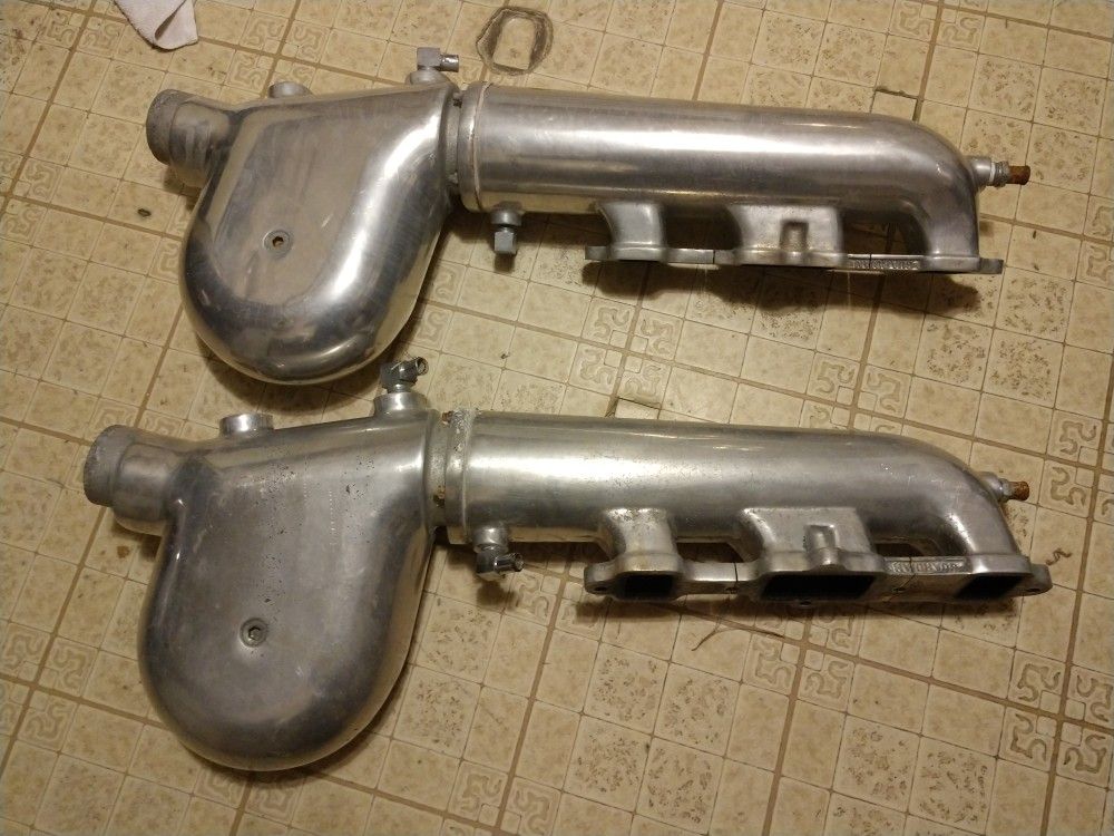 Guardian boat exhaust manifolds with water logs