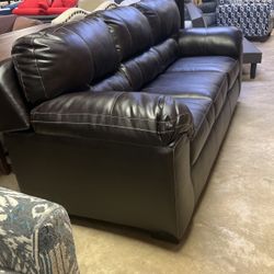 Brand new sofa in black or brown for only $500 matching recliner chair that rocks 400