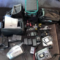 Panasonic palmcorder and JVC video movie compact VHS camcorder plus batteries chargers bags tapes and cords
