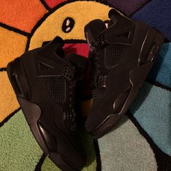 black cat jordan 4s