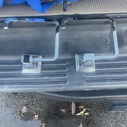 2 mirrors 2 towels holders 1 towel bar  and toilet paper holder
