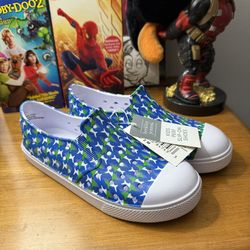 Blue and white slip-on shoes - size 2