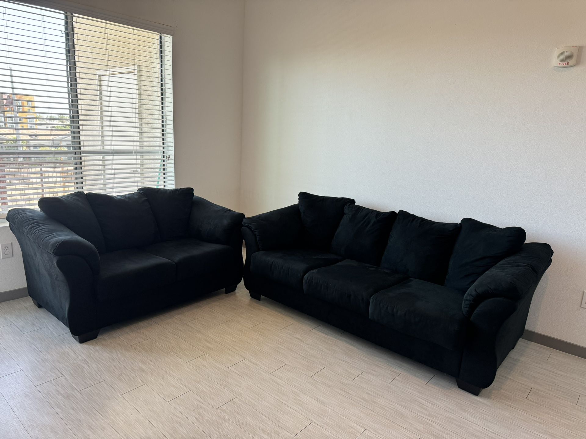 2 Ashley Furniture Black Couches