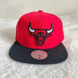 Mitchell & Ness Red and Black Bulls Snapback. Brand New With Tags!  $32.00 tag