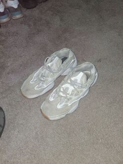 The shoes are white and they haven't been used yet