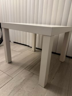 Modern  and minimalist white table