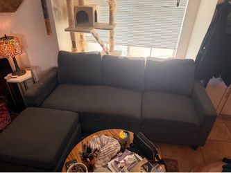 Navy blue couch with ottoman