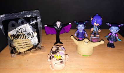 11 Mixed Piece Lot 3 Hotel Transylvania  2 Vampirina Vee Hauntley Girls + 1 Backpack 1 PJ Masks Wolfy Kevin 1 Mighty Max Corpus + 3 Bones Locked Safe