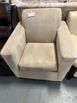 Large tan armchair (in store)