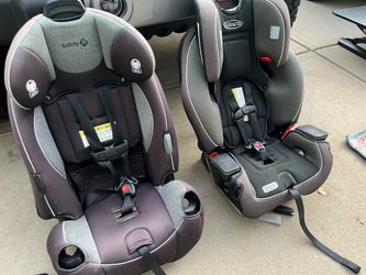 Two car seats and two strollers
