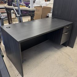 Contemporary bow-front executive desk in a grey wood-grain laminate finish - 60” x 29” Great Condition - Retail: $975