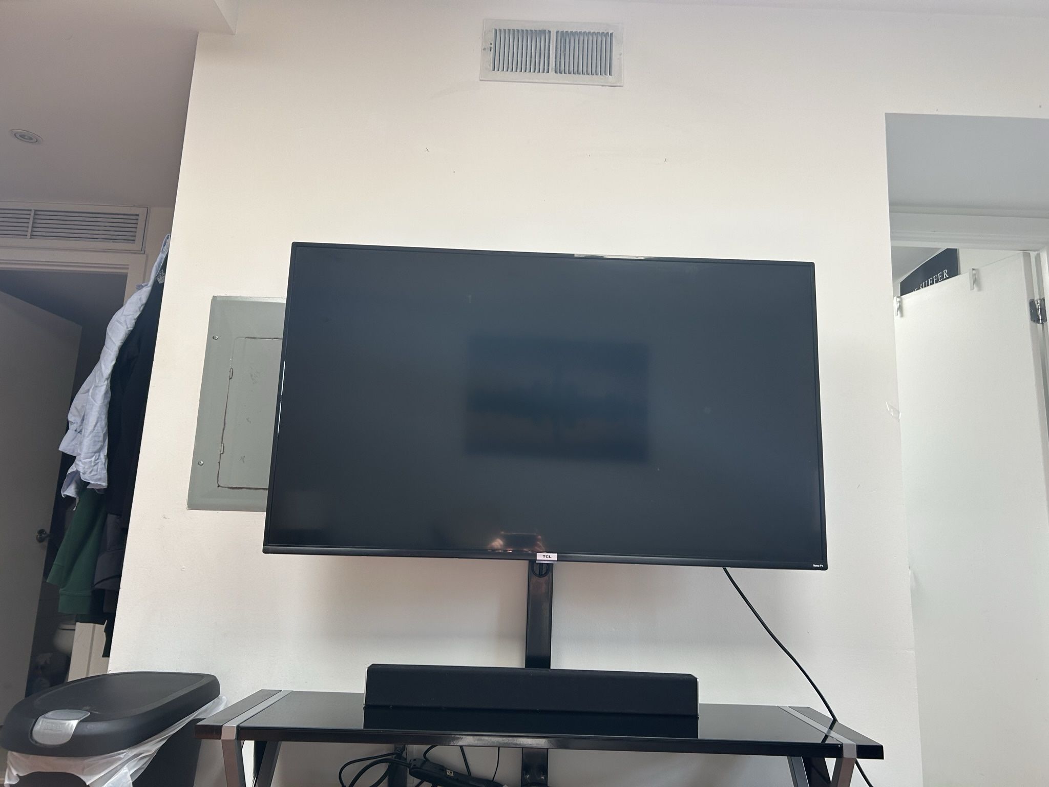 50” HD TCL Smart TV (internal Roku) And TV Stand