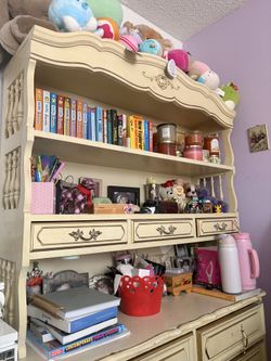 vintage French Provincial–style hutch/bookcase with a 3-drawer base