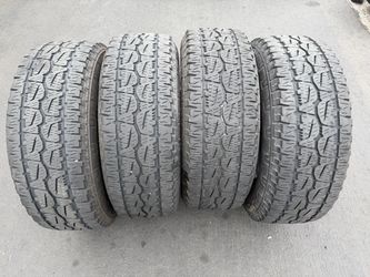 (4) 295/70R18 Bridgestone Dueler A/T Revo 3