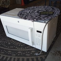 Microwave G & E New 60$