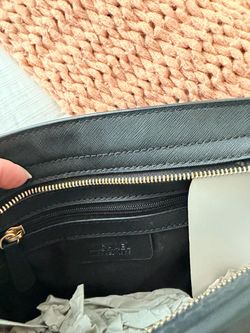 Michel kords  cross body bag