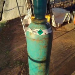 Compressed gas cylinder.