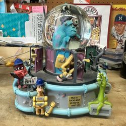 Disney Monsters Inc Musical Mechanical Snow Globe 